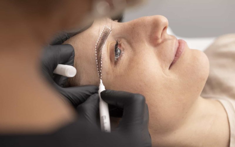 woman-going-through-microblading-treatment-scaled